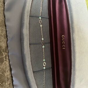 Gucci white gold/opal interlocking bracelet